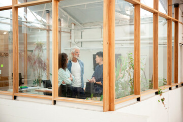 Group of financial workers discussing at meeting room