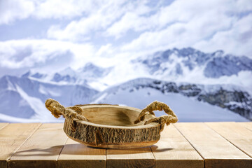 Desk of free space and winter landscape of mountains. Board with pedestal. Mockup background and...