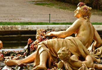 Versailles; France - october 27 2023 : statue in the castle park - obrazy, fototapety, plakaty