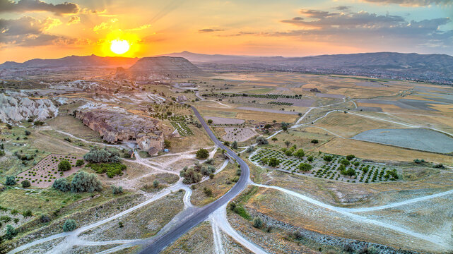 Panoramic view of fairy chimneys in Goreme Historical National Park. Goreme National Park and Rock Sites of Cappadocia, Central Anatolia, Nevsehir Province, Turkey. drone view. Ariel from above, top