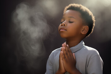 Pan African Boy Praying - Clasped Hands - Mist - Fog - Light of God Shining Down - obrazy, fototapety, plakaty