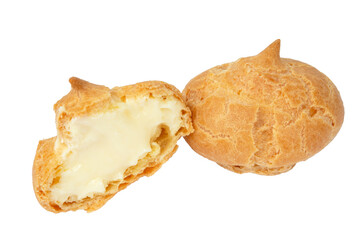 Homemade profiteroles with cream on a white background