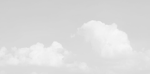 Cloudy sky, white clouds, black background pattern. Gray sky, White cloud in the sky. View on a soft white fluffy cloud as background. 