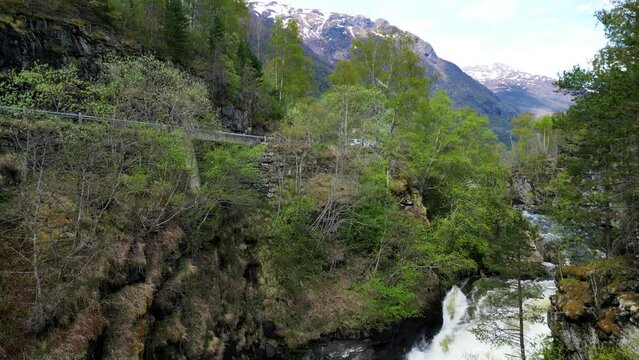 River gorge in Norwegian forest and mountain area, Lærdal River filmed by drone in 4K.