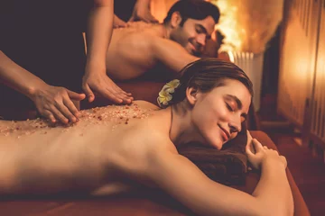 Keuken spatwand met foto Couple customer having exfoliation treatment in luxury spa salon with warmth candle light ambient. Salt scrub beauty treatment in Health spa body scrub. Quiescent © Summit Art Creations