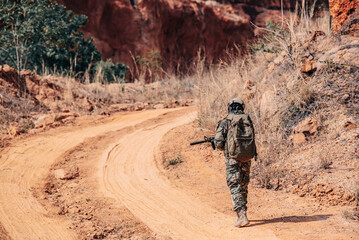 Soldiers of special forces on wars at the desert,Thailand people,Army soldier Walking patrol.