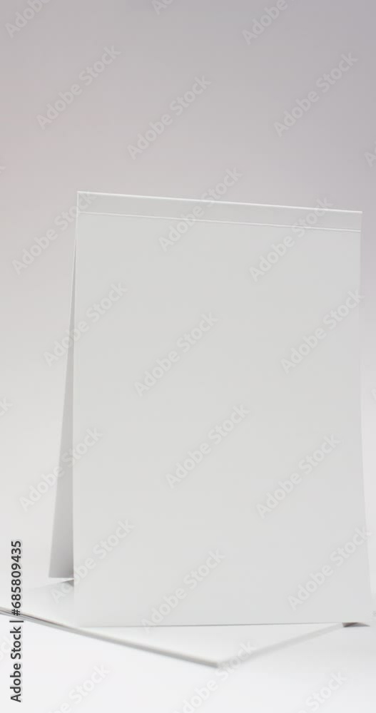 Canvas Prints vertical video of book with white blank pages and copy space on white background