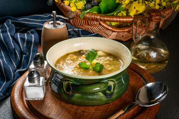 Barley soup with vegetables and chicken.