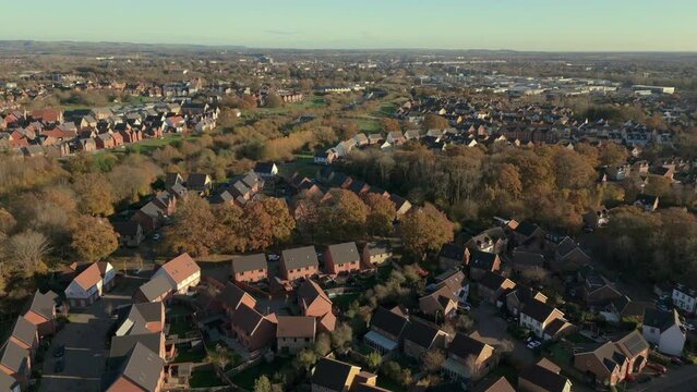 Aerial view of Repton Park (Ashford, Kent) small British city with woodlands and countryside view. 