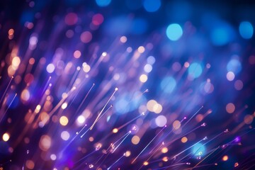 Fototapeta na wymiar Defocused image of fiber optics blue and purple lights abstract background