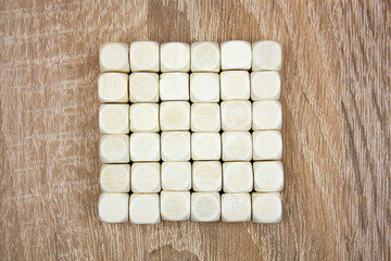 Wooden cubes folded into a cube shape. Set of wooden, wood cubes.