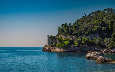 rocky cliff and protected area in the Bay of Grignano near Miramare Castle Trieste - Italy.