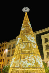 Christmas tree in Plaza de la Constitución, Constitution Square of Malaga City, Andalusia, spain