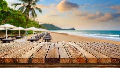 long wooden table with beach landscape blur background