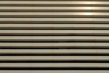 Obraz premium facade of a large store as a background, gray siding 5