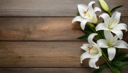 white lily flowers on wooden background top view with copy space funeral concept