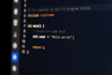 Code background. First strings of junior developer codding in compiler terminal