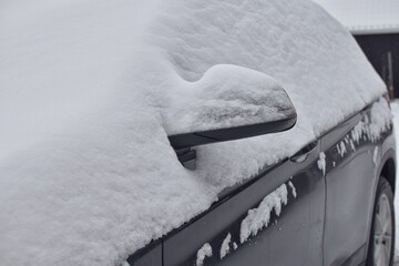 Snowy car after a snowfall