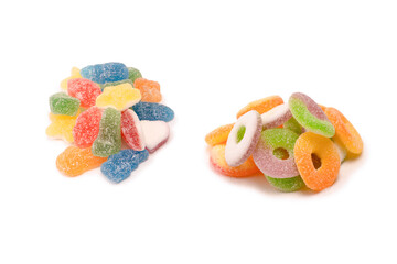 Assorted gummy candies isolated on a white background. Top view.