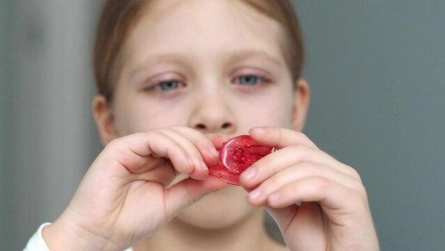 Minor bite correction using removable orthodontic appliance. twist the device in your hands - a plate for leveling the bite. plate for teeth. Removable plates and simple treatment.