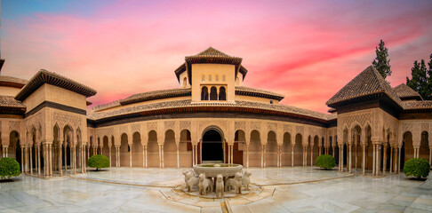 Panoramic view of the Patio de los Leones of the Alhambra palace, Granada, Andalusia, Spain at dusk