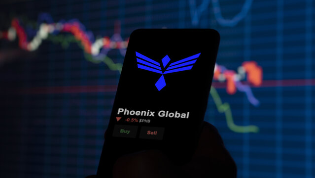 November 17th 2023. An investor analyzing the price of Phoenix Global, the token coin $PHB on a crypto exchange sreen.