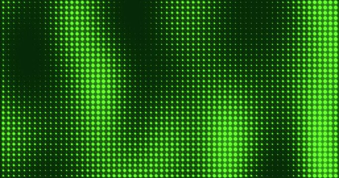 Abstract glowing green color halftone motion background. Moving dots seamless loop. Abstract animated dot texture background.