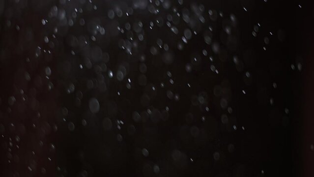 mist particles in slow motion