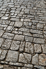 Ancient Greek, Cobblestone street pavement, vertical background pattern