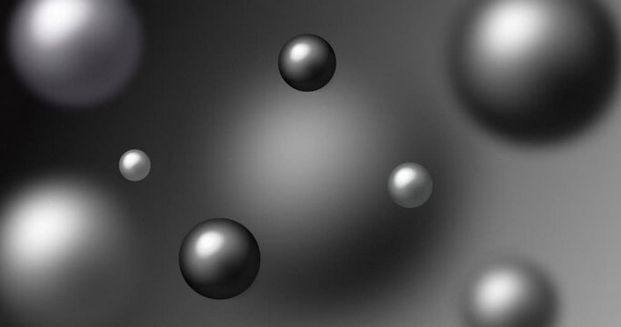 Multi-colored beads and pearls floating in the air with depth of field. Abstract silver and black color spheres levitating and moving over grey background.