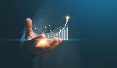Business growth, progress or success idea concept, Businessman showing virtual graph hologram in hand, strategy planning, stock market, digital assets, corporate future growth plan.