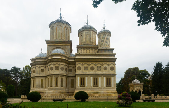 View of Romanian Orthodox Cathedral of Curtea de Arges in sunny autumn day