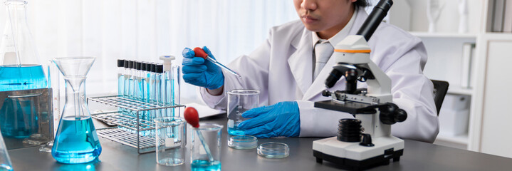 Scientist conduct chemical experiments and research in medical lab as groundbreaking developing for...