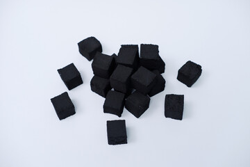 photo of box-shaped charcoal briquettes