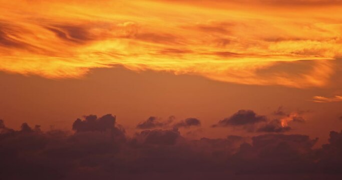 4K sunset dusk twilight evening timelapse vibrant clouds. Orange sky dramatic gloaming transcendent cosmic celestial symphony. Breathtaking eventide colors creating an ethereal cinematic masterpiece