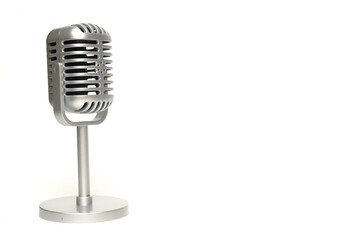 A picture of classical monochrome microphone on isolated copyspace white background