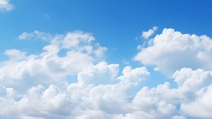 Naklejka na ściany i meble White fluffy clouds against a blue sky