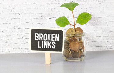 Broken links - text concept website on a wooden background surrounded by cubes