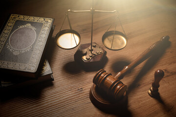 Wooden gavel, weight scale, law concept