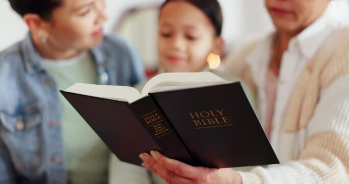 Religion, bible and family reading at their home for knowledge, faith and holy education. Spiritual, humble and people studying the book together for worship, trust and forgiveness at modern house.