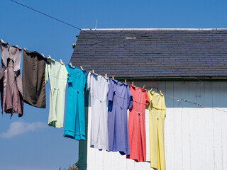 Amish dresses drying on a clothing line in Lancaster, PA