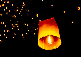 Sky paper lanterns releasing  in the sky on loi Kratong festival, yi peng in Chiangmai - obrazy, fototapety, plakaty
