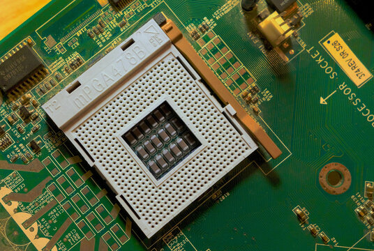 Kielce, Świętokrzyskie, Poland - 2023-11-25 - Old type Intel Pentium 4 processor socket on the motherboard - photo of a working board without processor