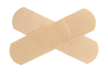 Medical adhesive bandages isolated on white, top view
