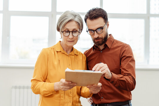 Focused business people, successful colleagues planning startup