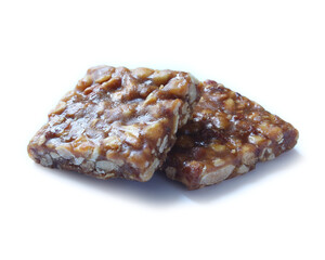 Peanut candy on white background. Traditional northeast Brazilian sweet 