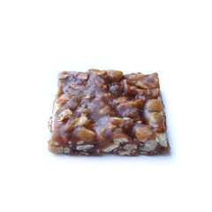 Peanut candy on white background. Traditional northeast Brazilian sweet 