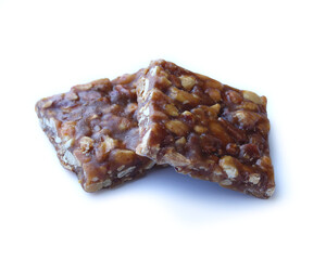 Peanut candy on white background. Traditional northeast Brazilian sweet 