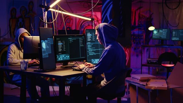 Skilled hacker group members deploying malware on unaware victims computers, stealing sensitive and private information, selling it on darknet crime haven to highest bidder