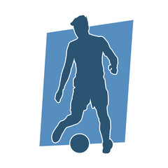 Silhouette of a muscular man playing ball. Silhouette of a male with an athletic body in action playing a ball.